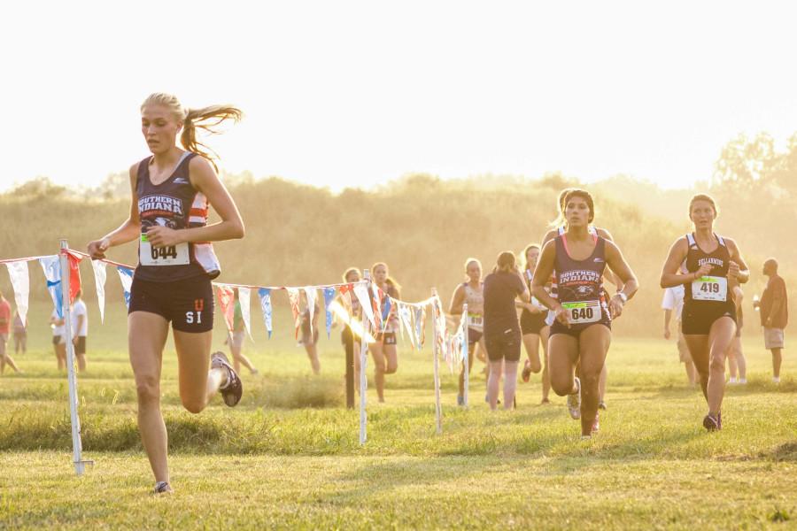 Junior business major Alyssa Moore runs during the Stegemoller Classic at Angel Mounds in Evansville, Sept. 4. The team finished the NCAA Division II Championship in 10th place this season.