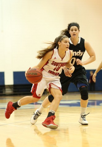 Junior guard Tanner Marcum drives into the lane during the second half of the women’s basketball game against University of Indianapolis in the PAC on Thursday.