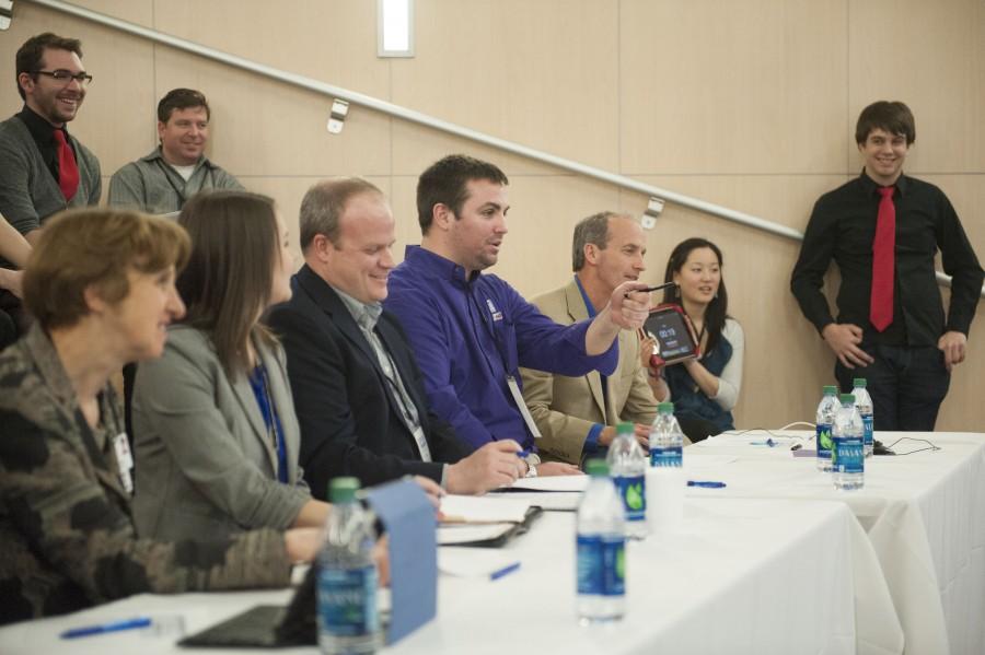 The judges at Startup Weekend Evansville 2015 ask questions about a participant’s idea during the Friday round. At this stage each year, 10 participants are selected to move on to the final stages.