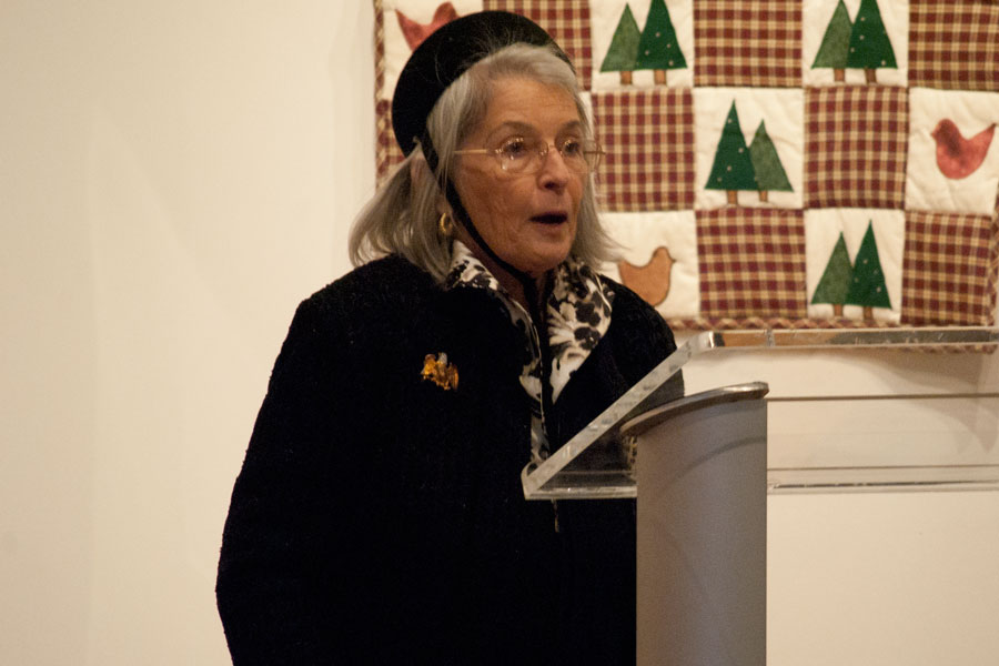 Judy Morton, a university alumn, speaks during the exhibit's reception on Sunday in the Pace Gallery. Morton and late husband Tom Morton donated the Morton Quilt Collection to the university in 2013. 