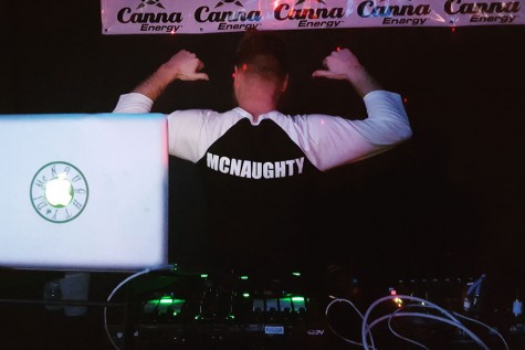 Auston Bruder, also known as DJ McNaughty, prepares to play a set at Jimmy’s Hobo Jungle in Evansville.
