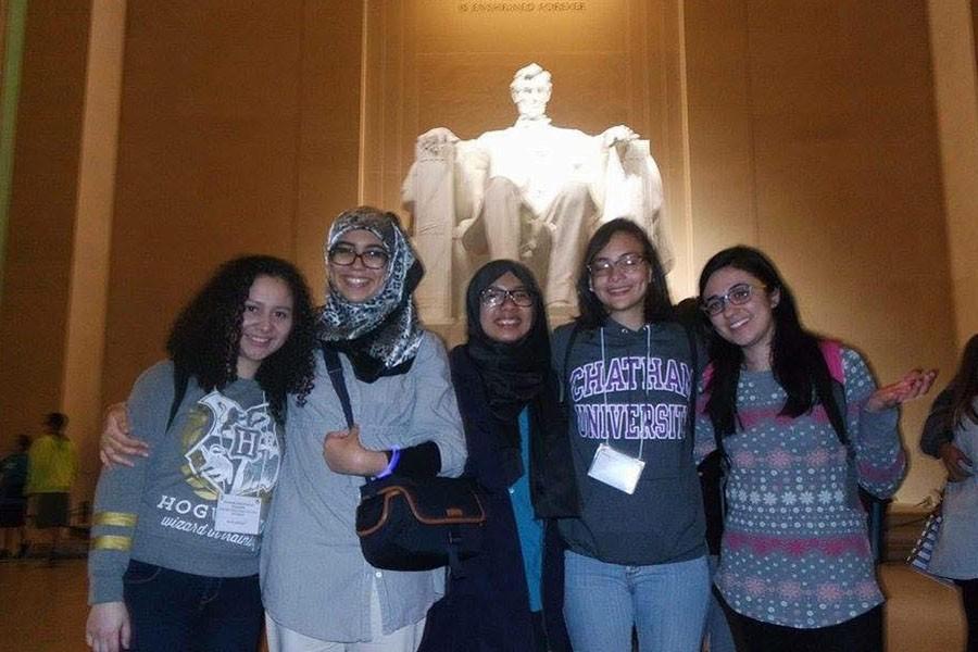 Deena Bregheith (far right), a junior English major, joins her friends in front of the Lincoln Memorial during her trip to Washington, D.C. 