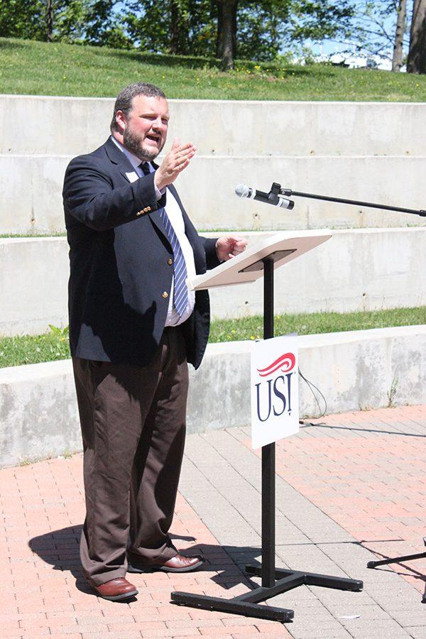 Dean of Students Brian Rush speaks at the Stand Against Racism rally put on by the YWCA at the Amphitheatre on Thursday. “Racism does not have a place here at Evansville or at the University of Southern Indiana,” Rush said. 
