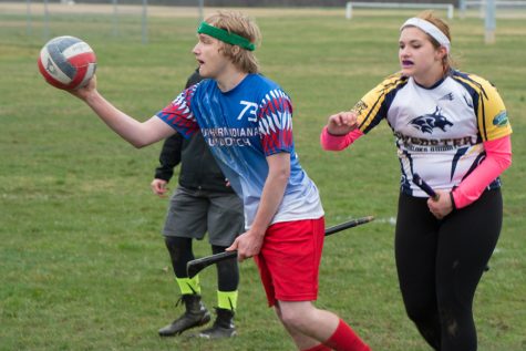 Senior keeper Shane Ritz looks for a teammate to pass the quaffle to during this year’s Eagle Cup. Ritz has been on the team for four years and is the vice president of the organization. 