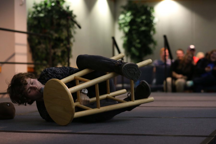 Comedian and former “America’s Got Talent” contestant Drew Lynch purrs as he straddles a stool, acting as a cat during his performance April 6, in Carter Hall. Lynch’s comedy act was one of many events on campus for the annual SpringFest celebrations.