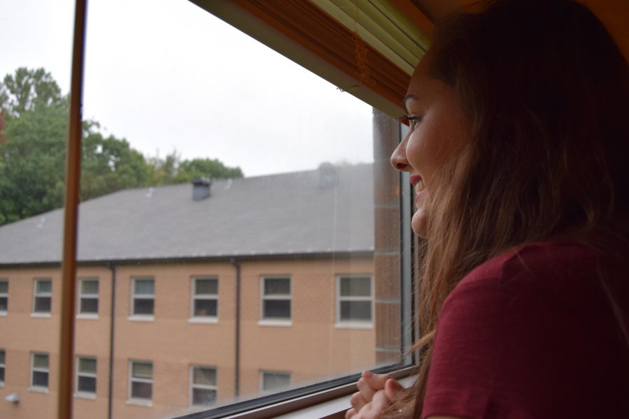 After unlocking her dorm room for the first time, Fredrick gazes out of her window in Governors Hall. “It’s my new backyard,” she said to her mother, pointing out how green the view is compared to California.