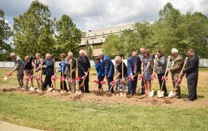 Linda Bennett, donors and student ambassadors break ground on the Fuquay Welcome Çenter last Friday. There will be an official ribbon cutting ceremony for the center in 2018.