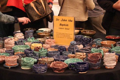 A table is filled with bowls Saturday afternoon at Sauced for the Empty Bowls event. Participants were able to choose a bowl from the choices to purchase for $10 toward charity. 