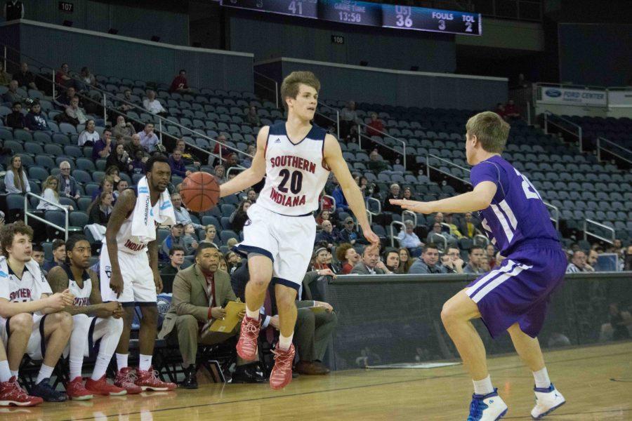 Alex Stein, a sophomore guard, drive to the basket Thursday night in the first round of the GLVC tournament at the Ford Center. The Eagles lost to Truman State 69-68.