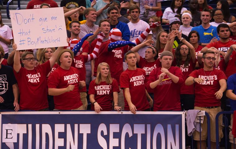 Members of Archie’s Army cheer on the volleyball team during a game last year. The organization is the university’s official student section. 