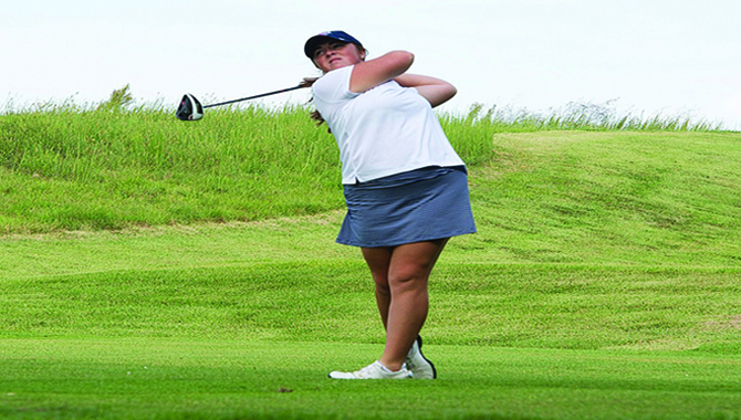 Junior Taylor Howerton follows through with her swing during the Screaming Eagles Golf Classic in September. Howerton transfered to the university to compete in the 2016 season after spending her freshman year at Indiana University. 