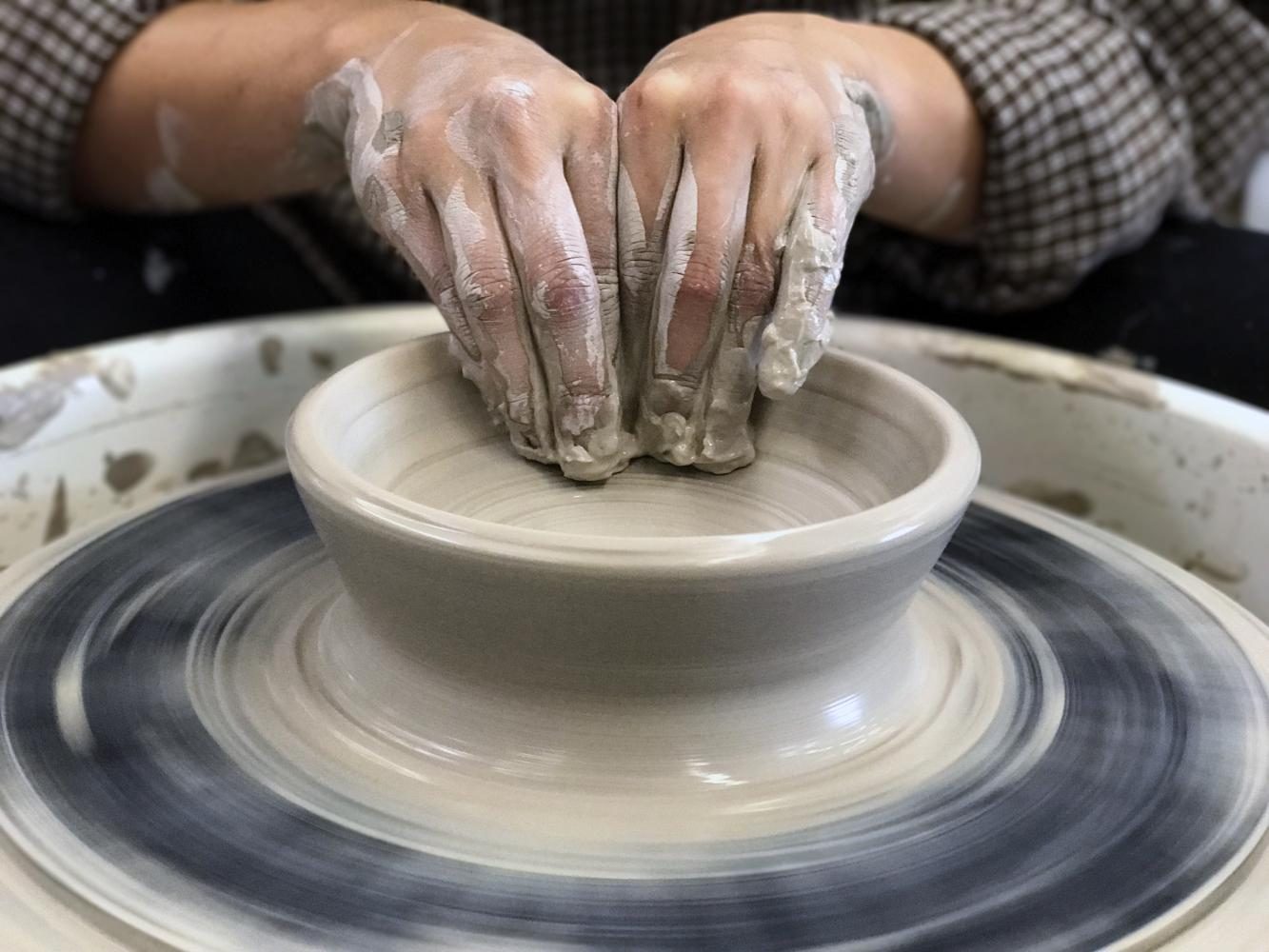 Dr. Stephanie Young, Associate Professor of Communication Studies makes a bowl out of clay during the 6th annual Bowl-O-Rama Friday afternoon. USI holds several events where volunteers make bowls for Empty Bowls Evansville.