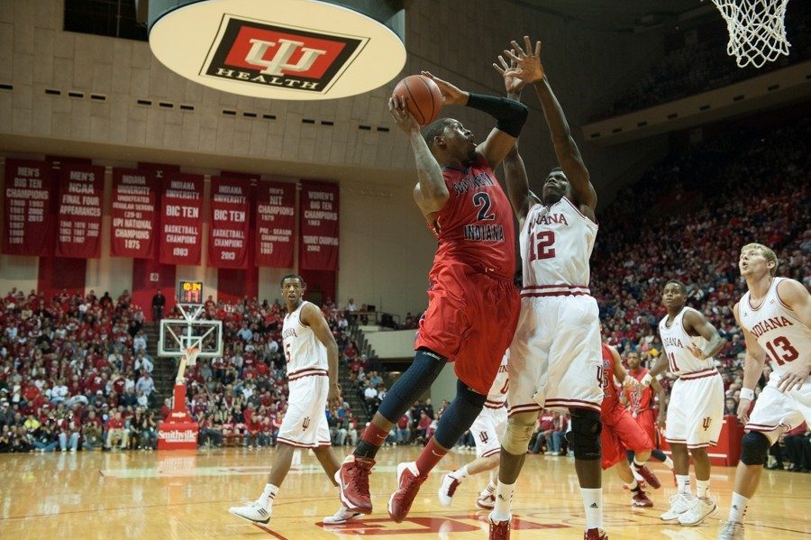 Aaron Nelson (2) going for a basket against Indiana University Oct. 26, 2013 in USIs exhibition opener in Assembly Hall. Nelson finished with 14 points and 7 rebounds.