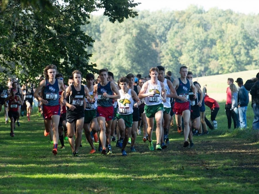 Titus Winder and Austin Nolan lead the pack of runners during a meet. The team will compete at Tom Sawyer State Park for the Great Lakes Valley Conference Championships Saturday