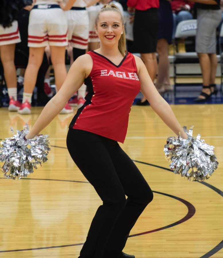Miranda Brooks dances during the basketball game Saturday. 