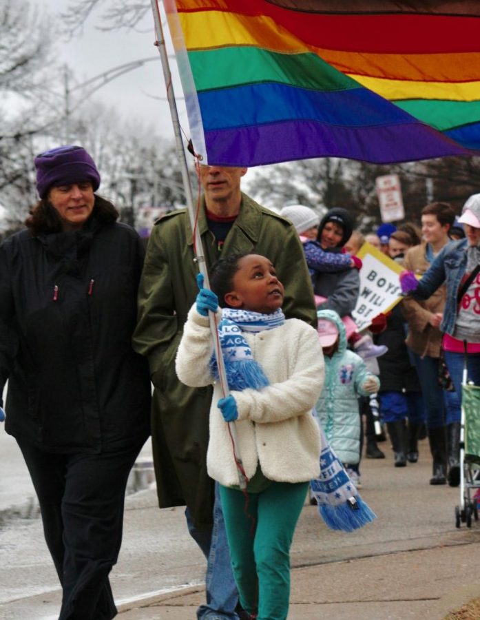 Evansville Community members march for womens rights Saturday afternoon. 