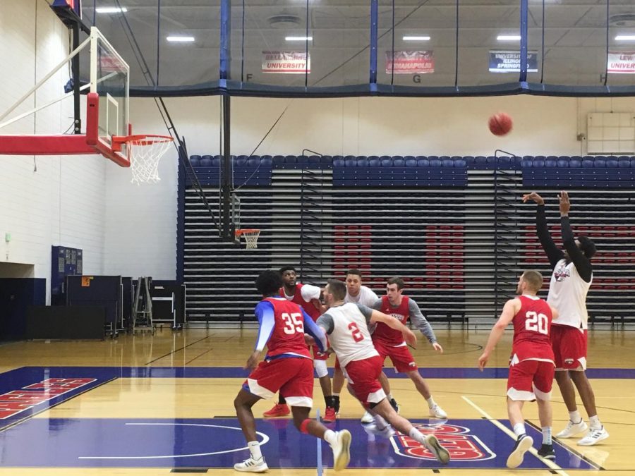 Emmanuel Little shooting at practice Friday.