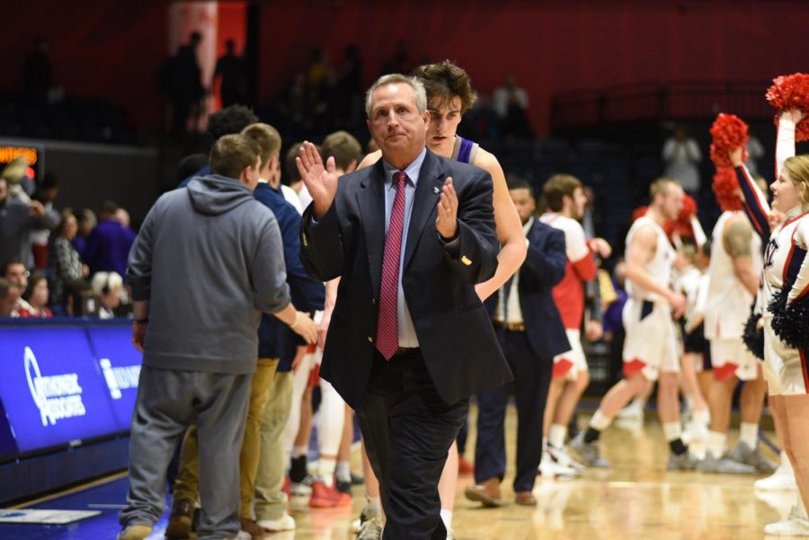 Coach Rodney Watson celebrates his 232 career win at USI after defeating Kentucky Wesleyan 82-63 at the Screaming Eagles Arena. Watson announced his retirement Monday.