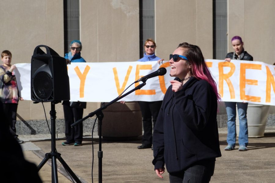 Josie Ault, president of USI’s vegetarian club, speaks at Saturday’s Face the Future Rally. 
