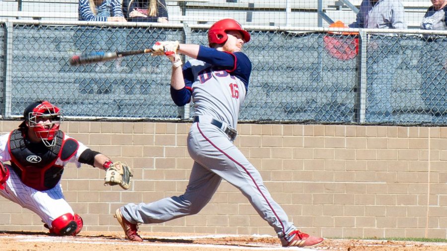 Aaron Euler, a junior outfielder, bating against William Jewell on March 3.