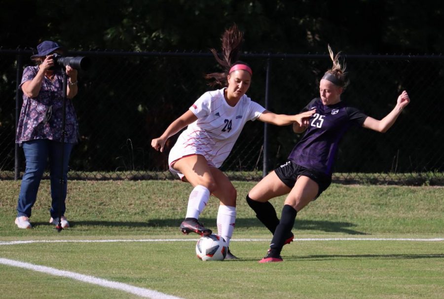 Midfielder Peyton Wilkinson defends against Trevecca Nazarene in Thursdays game. It was 82 degrees as the womens soccer team kicked off the season.