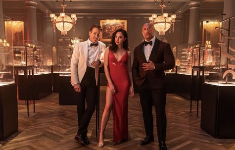 Reynolds, Johnson and Gadot pose for “Red Notice” promotional image. “Red Notice” is Netflix’s newest heist movie.