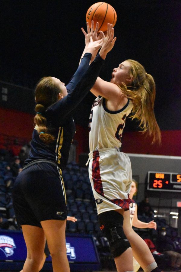 Meredith Raley, sophomore forward, goes up for a shot.