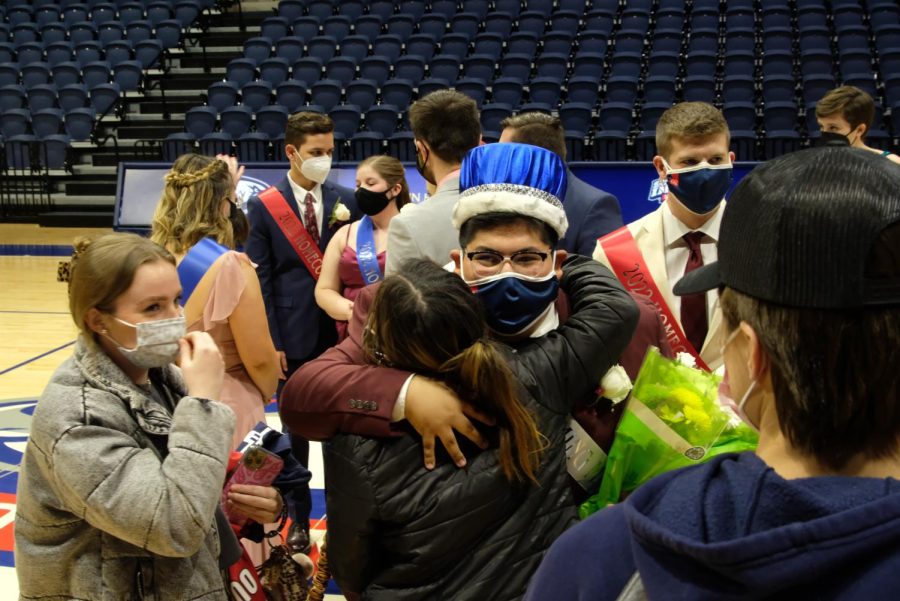 Hairo rivas hugs his friends and supporters after the crowning ceremony ended Saturday. I still cant believe it, Rivas said. Its and honor to just be on the court, its so surreal, its a dream.