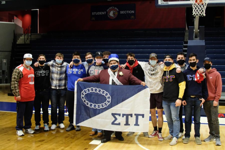 Hairo Rivas stands with his fraternity brothers in Screaming Eagles Arena Saturday. Rivas was president of the universitys chapter of Sigma Tau Gamma. 