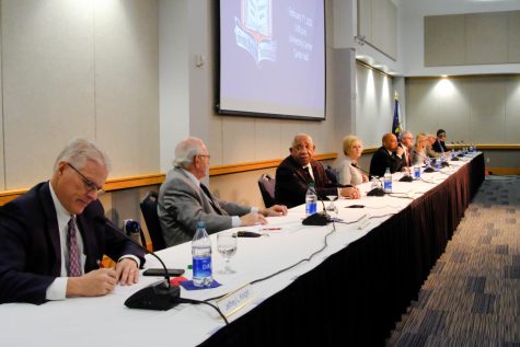 Members of the university Board of Trustees make a unanimous vote to transition to Division I athletics Monday. 