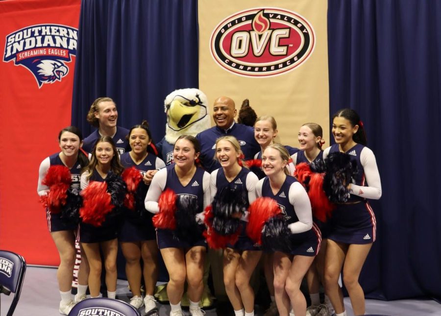 President Ronald Rochon, Archie and the cheer team shout Lets Go after the announcement Wednesday that university athletics is joining the Ohio Valley Conference. USI athletics will be applying for reclassification from NCAA Division II to Division I with the OVC as its partner. 
