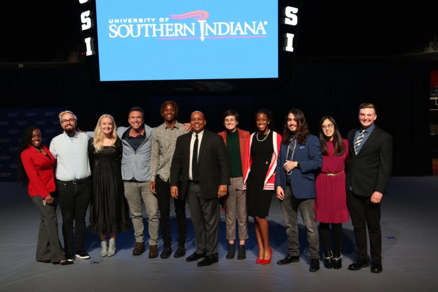 President Ronald Rochon, College Tour host Alex Boylan and students featured in the College Tour episode gather for a photo during the episode premiere.