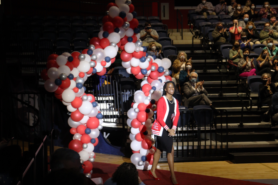Perci Hale, one of the ten students featured in the universitys College Tour episode, walks into the Screaming Eagles Arena Wednesday afternoon. The students featured, President Ronald Rochon and Alex Boylan were announced at the College Tour Premier and entered the room through a balloon star on red carpet. 