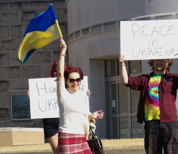 Luba Piechn, an Evansville resident from Ukraine came to USI to join the protest. She proudly waved her Ukrainian flag and handed flags to several of her fellow protestors.