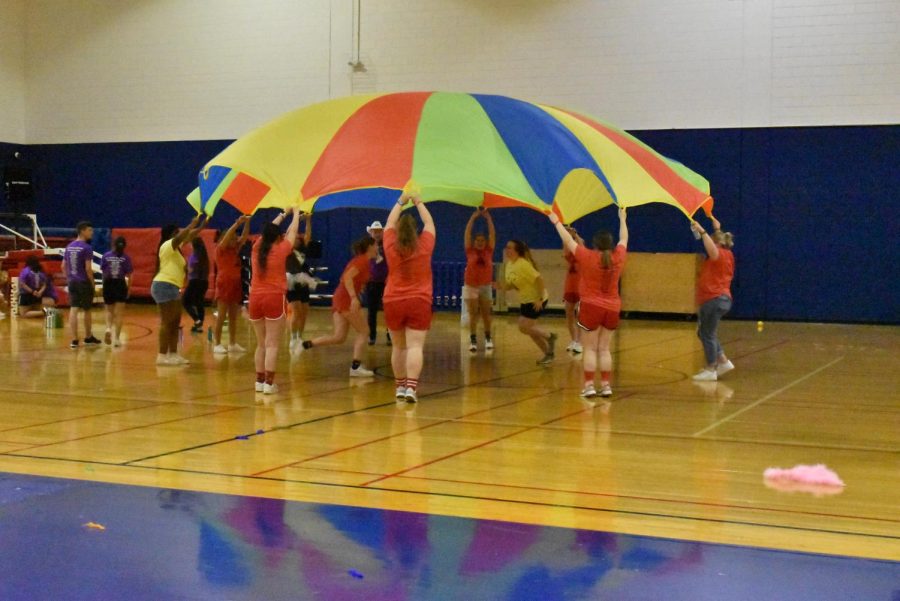 Participants at Southern Indiana Dance Marathon 2022 play with a parachute Saturday afternoon. 