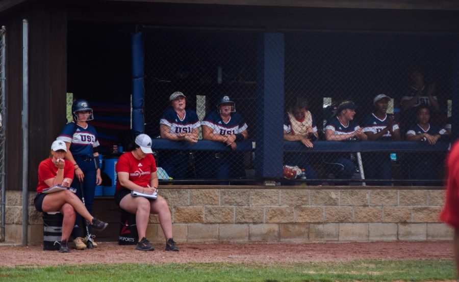 The universitys womens softball team sang songs to their hitters on Sunday to pump them up before a swing.