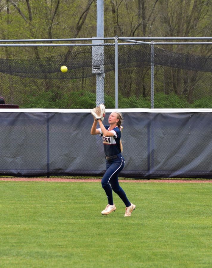 Mackenzie Bedrick, sophomore outfielder, catches a fly ball in the center field Sunday. Bedrick went 3-3 and had a stolen base at the game.