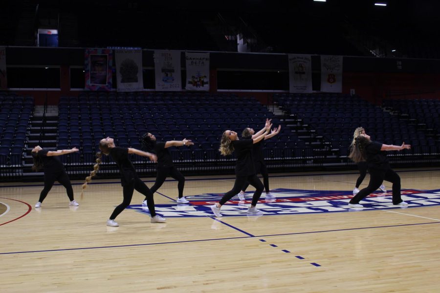 Sigma Sigma Sigma stretched out their arms toward each other near the beginning of their dance. Their routine included many songs from the hit show Euphoria. At the end of the performance, the members held up a sign stating End Substance Abuse which is one of the major points of the show.