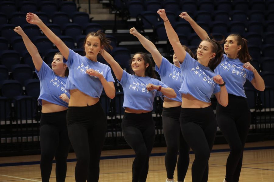 Gamma Phi Beta members struck a heroic pose during their routine. Their Friends based performance allowed the girls friendships with each other to really shine through.