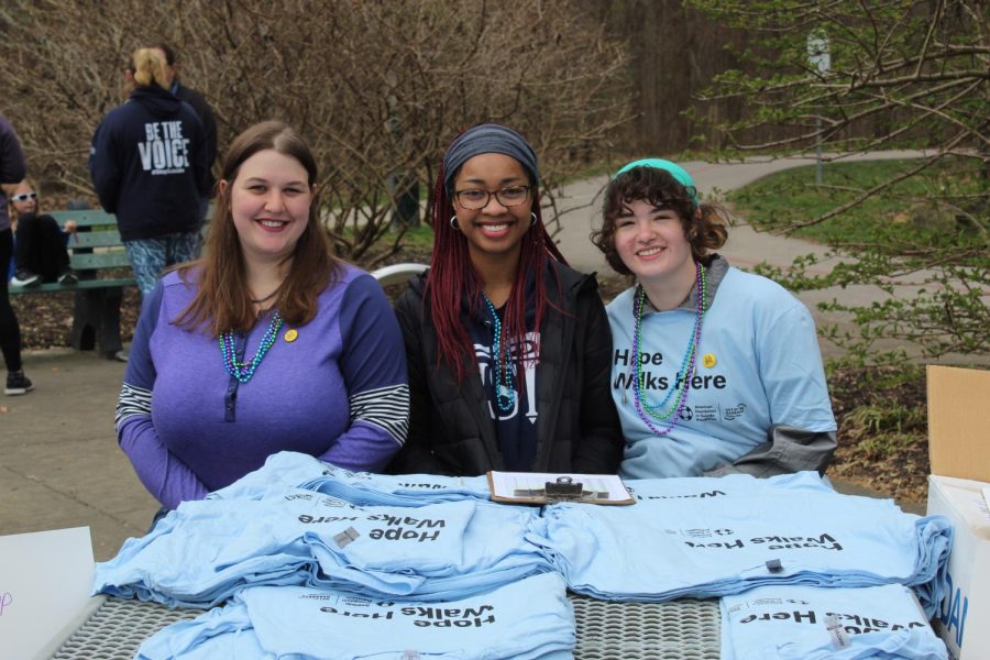 (Left to right) Isabelle Hardebeck, junior business administration major, Makala Jeffcoat, junior health informatics and health administration major, and Erin Hanley, sophomore biology major, handed out shirts to those who had raised over $100 for the cause. All money raised would be donated to the American Foundation for Suicide Prevention.