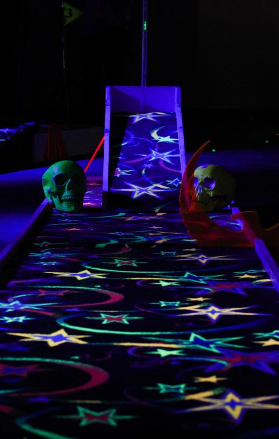 The GloCades neon colors light up the mini golf included in the event at SpringFest 2022.