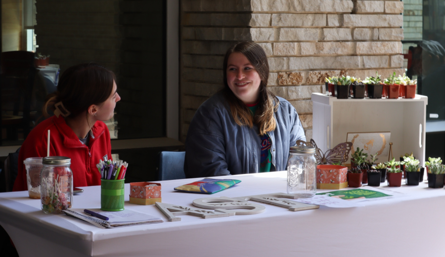 Alexandria Allison, sophomore nursing major, and Madison Williams, freshman biology major, selling succulent plants to better Evansville at the Breezeway for Alpha Sigma Tau on Tuesday.