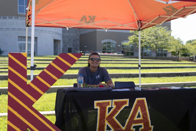Jackson Wendel, senior engineering technology major, advertises his fraternity, Kappa Alpha, outside the David L. Rice Library Aug. 22. Wendel said he was there to recruit students to his fraternity.