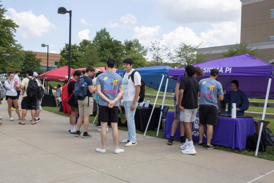 Students meet with fraternity recruiters outside the David L. Rice Library on Aug. 23. Greek Life organizations recruited everyday of the first week of Fall 2022 classes.