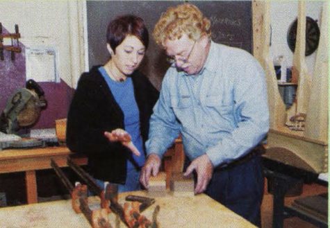 McNaughton working with a student in 2003.