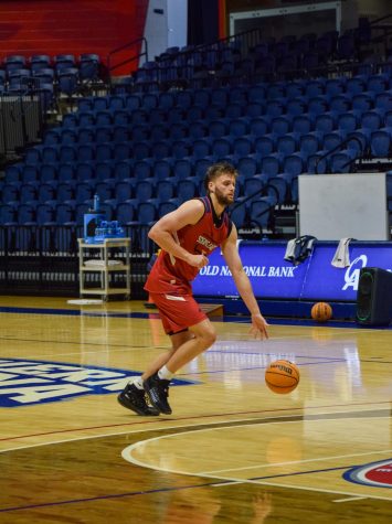 Trevor Lakes, senior forward, begins practice on Sept. 27 with working on his dribbling skills. Lakes joined University of Southern Indiana from University of Nebraska and University of Indianapolis to play with Coach Stan Gouard once again.