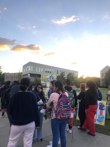 tudents mingle near the Panamanian Association table at the Latinx Heritage Festival on The Quad Wednesday. This was the university's first Latinx Heritage Festival. (Photo by Alyssa DeWig)