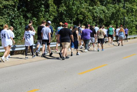 Students participate in Active Minds' annual National Suicide Prevention Month Memory Walk on campus Saturday. (Photo by Bryce West).