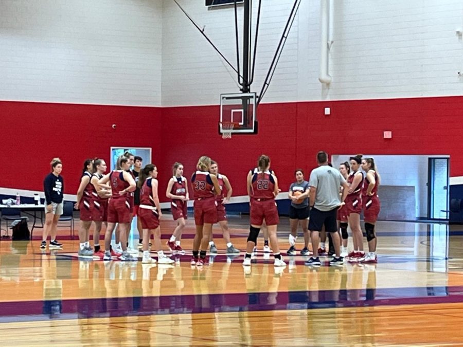 Womens basketball team before their first official practice of the season on Sept. 27. The team had many players return, including USI graduate Emma Dehart as an assistant coach.