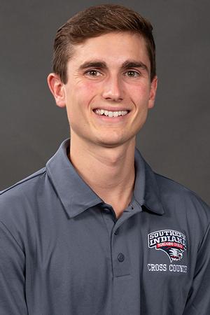Austin Nolan, USI alumnus, returns to the cross-country and track and field team as a coach under head coach Mike Hillyard in Division I.